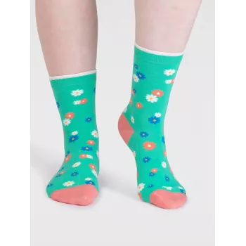 Chaussettes en coton biologique avec lamas colorés et motifs de fleurs.