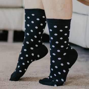 Chaussettes bio en coton imprimé pois blanc sur fond noir